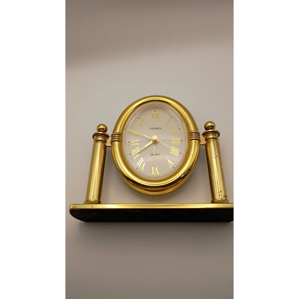 Linden Quartz Oval Desk Clock Gold Tone Swivel Pillar Mantle Timepiece